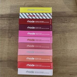 RHODE Peptide Lip Tints Assorted Reds, Pinks & Coral Boxes